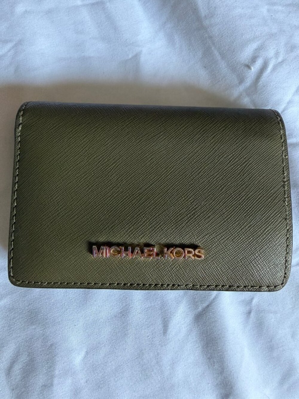 Authentic Michael Kors compact wallet in an olive green Saffiano-style leather